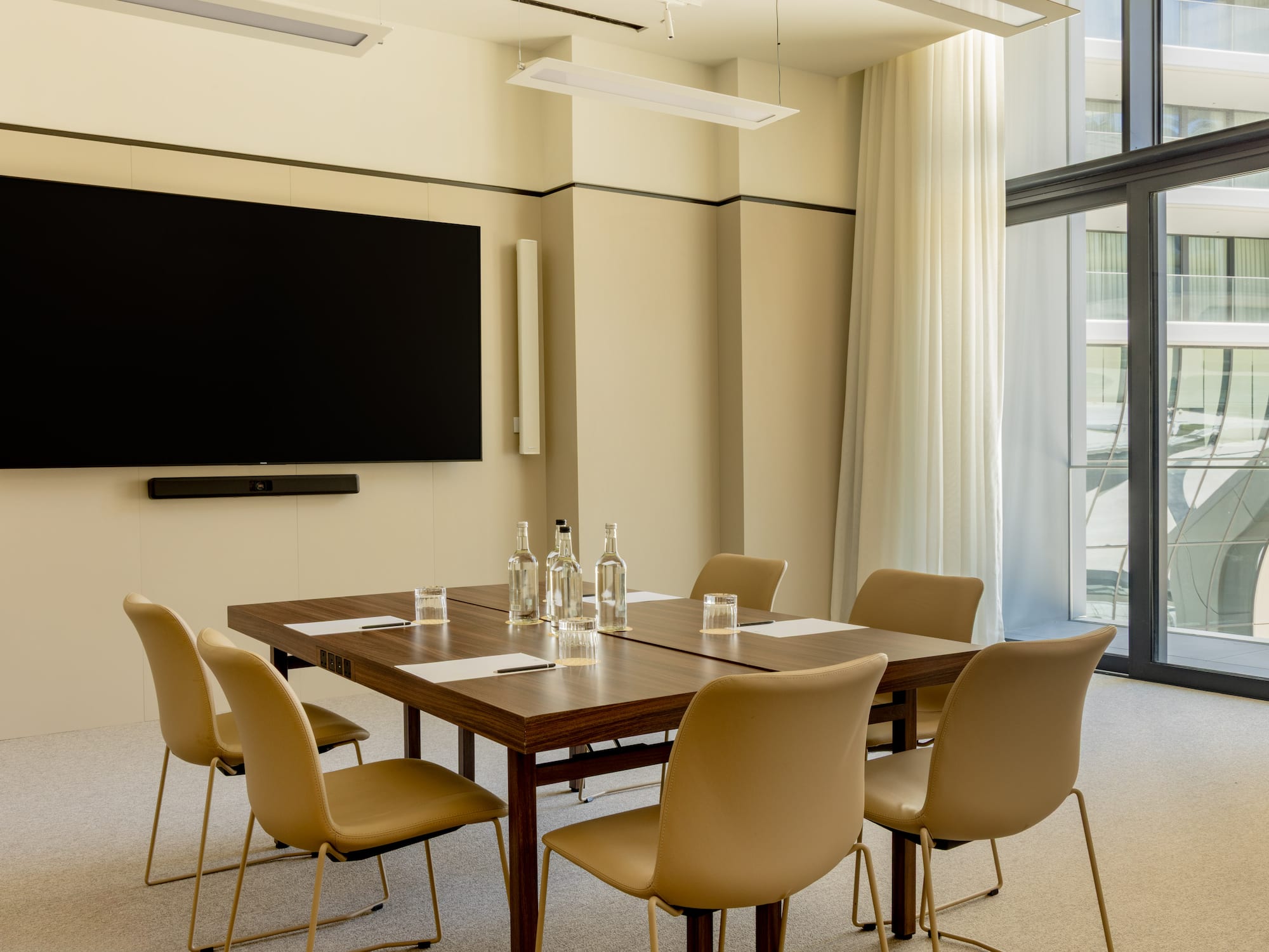 a room with a table and chairs