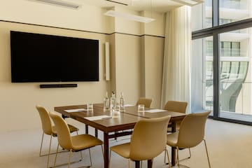 a room with a table and chairs