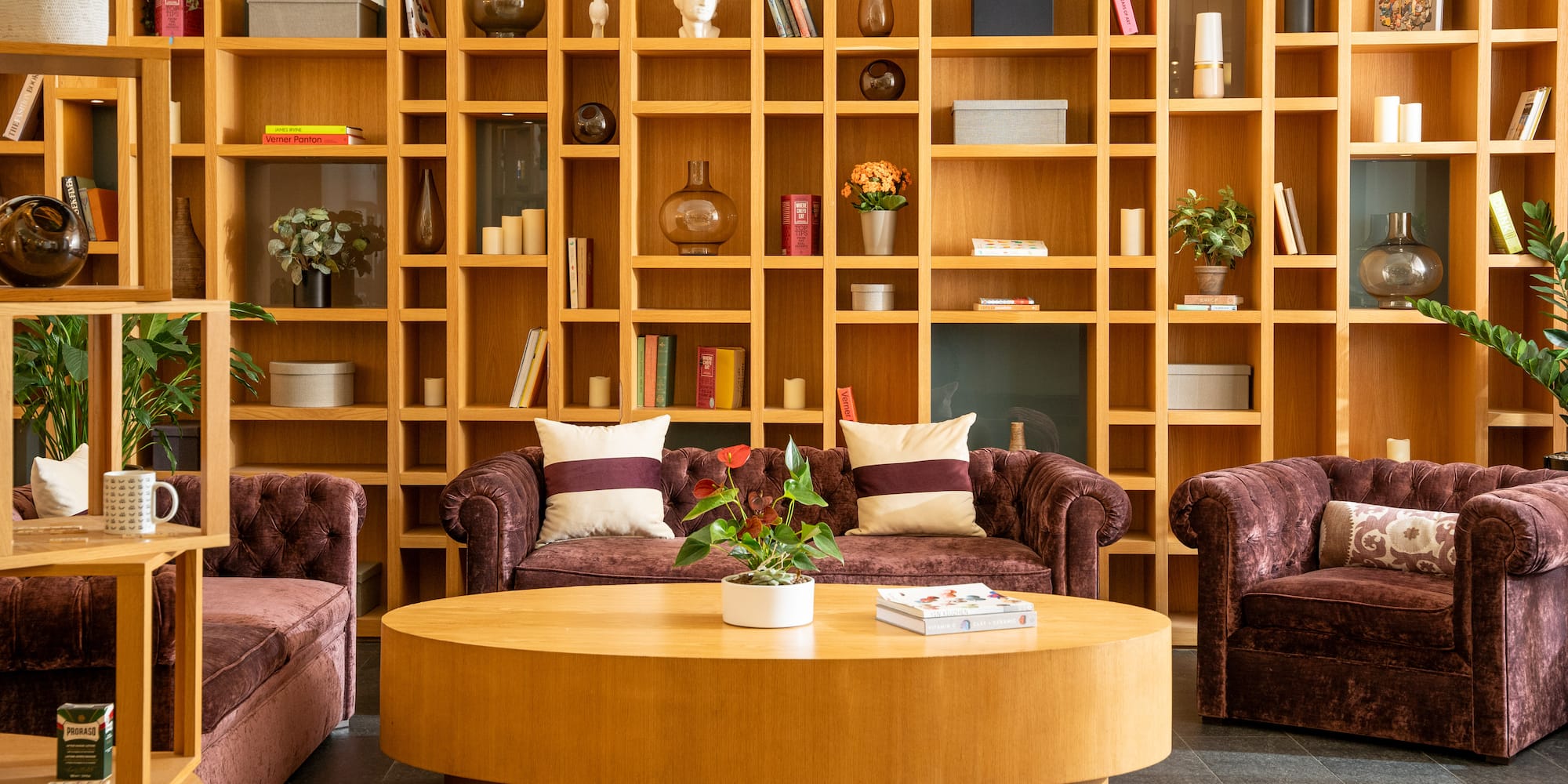 a room with a coffee table and couches