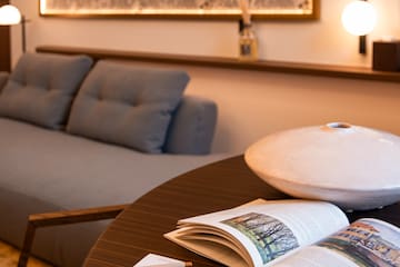 a table with a book and glasses on it
