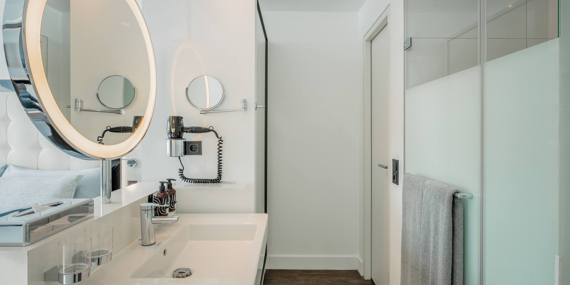 a bathroom with a mirror and sink