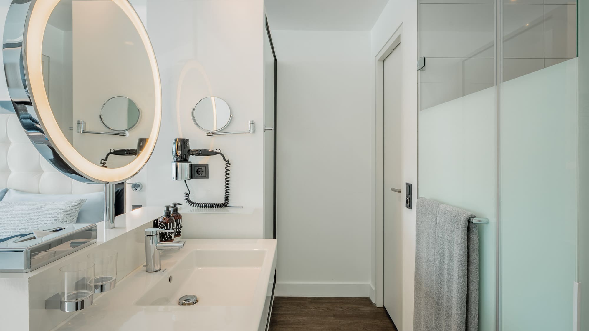 a bathroom with a mirror and sink