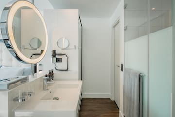 a bathroom with a mirror and sink