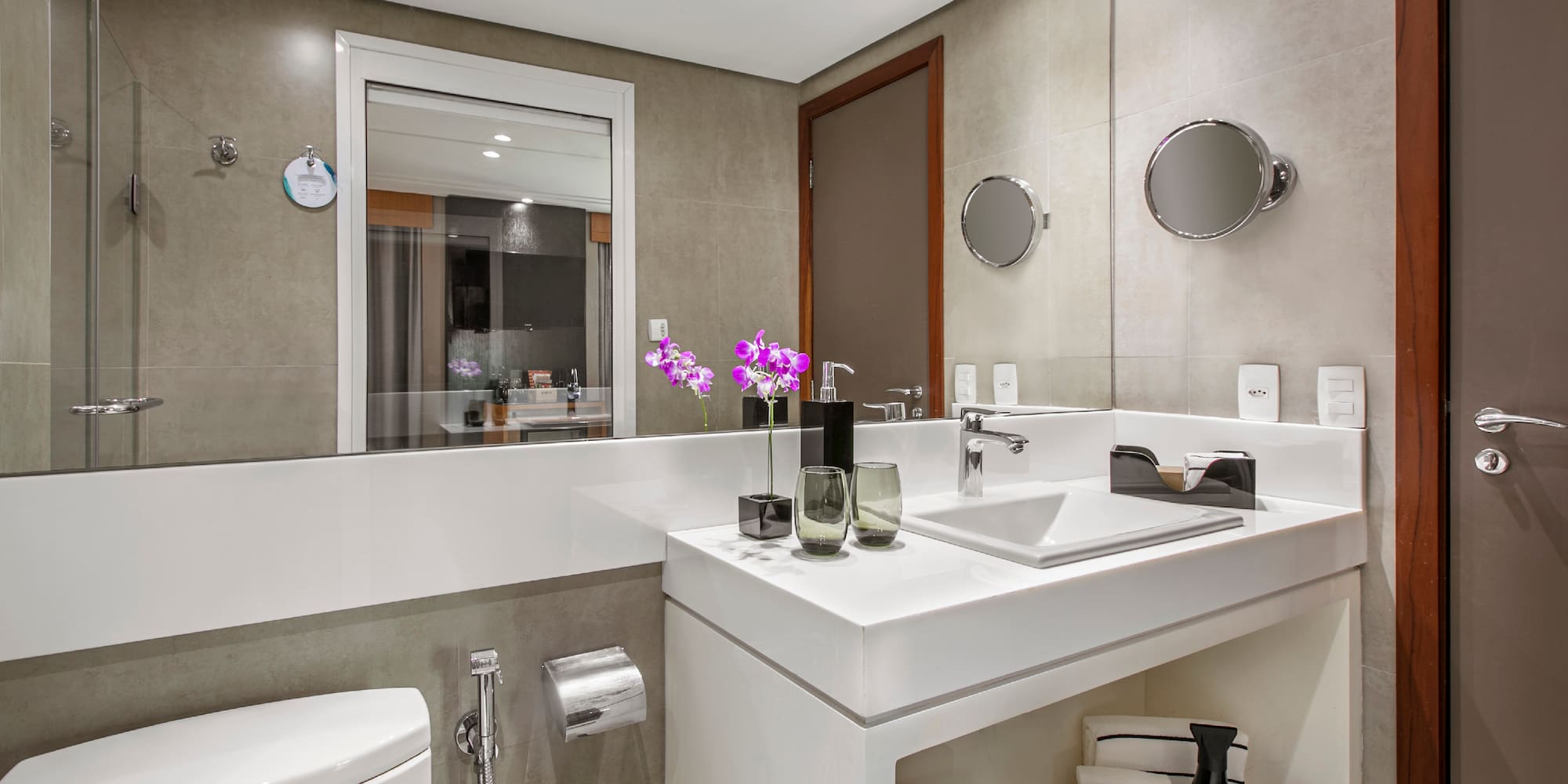 a bathroom with a sink and toilet