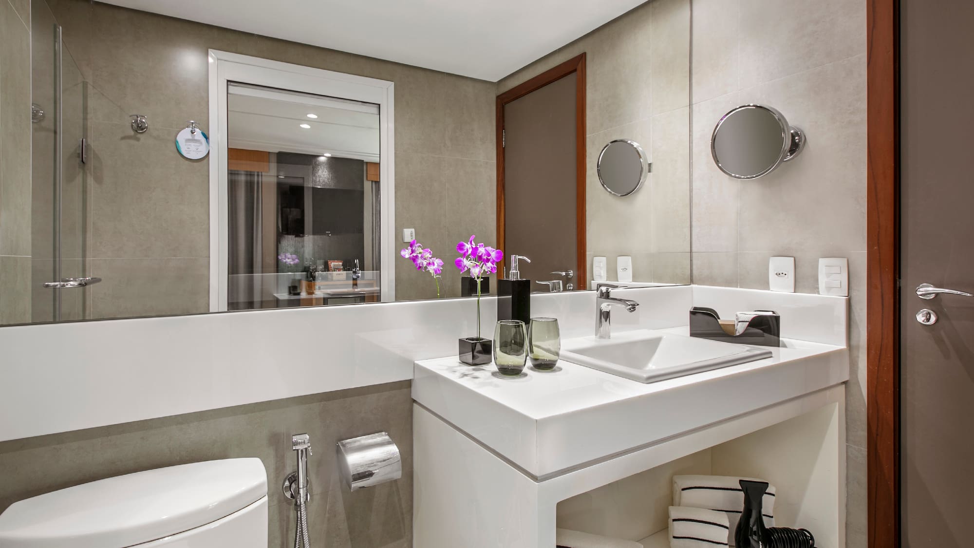 a bathroom with a sink and toilet