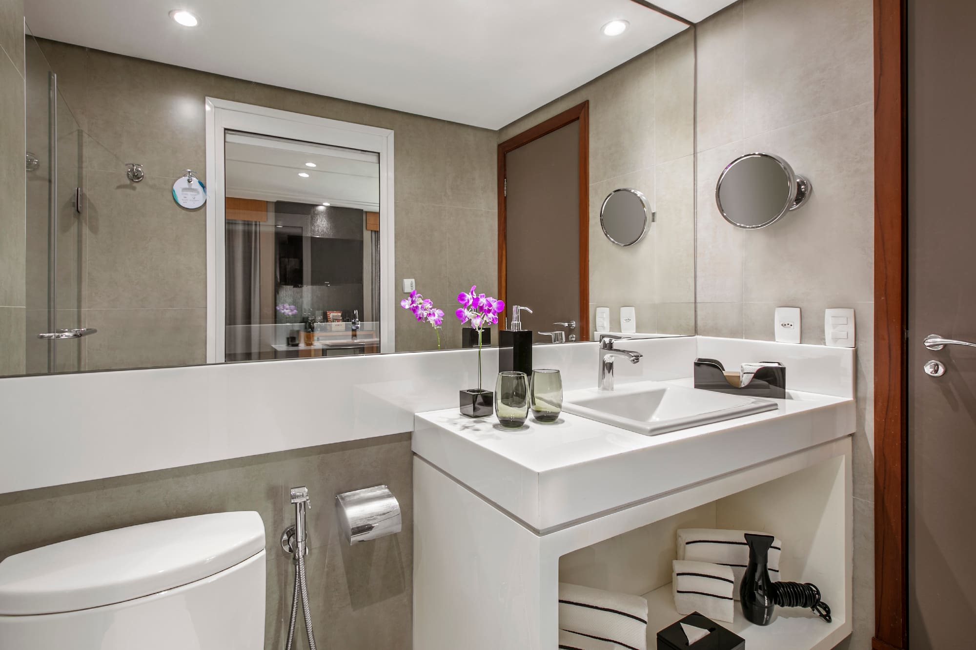 a bathroom with a sink and toilet