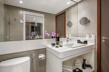 a bathroom with a sink and toilet