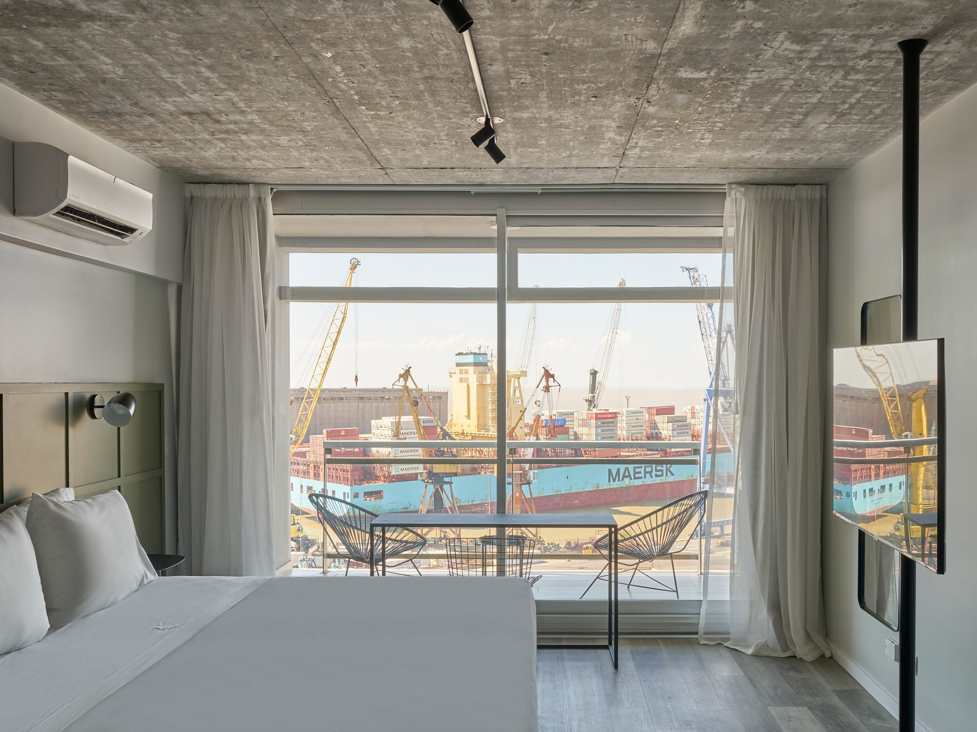 a room with a bed and a window