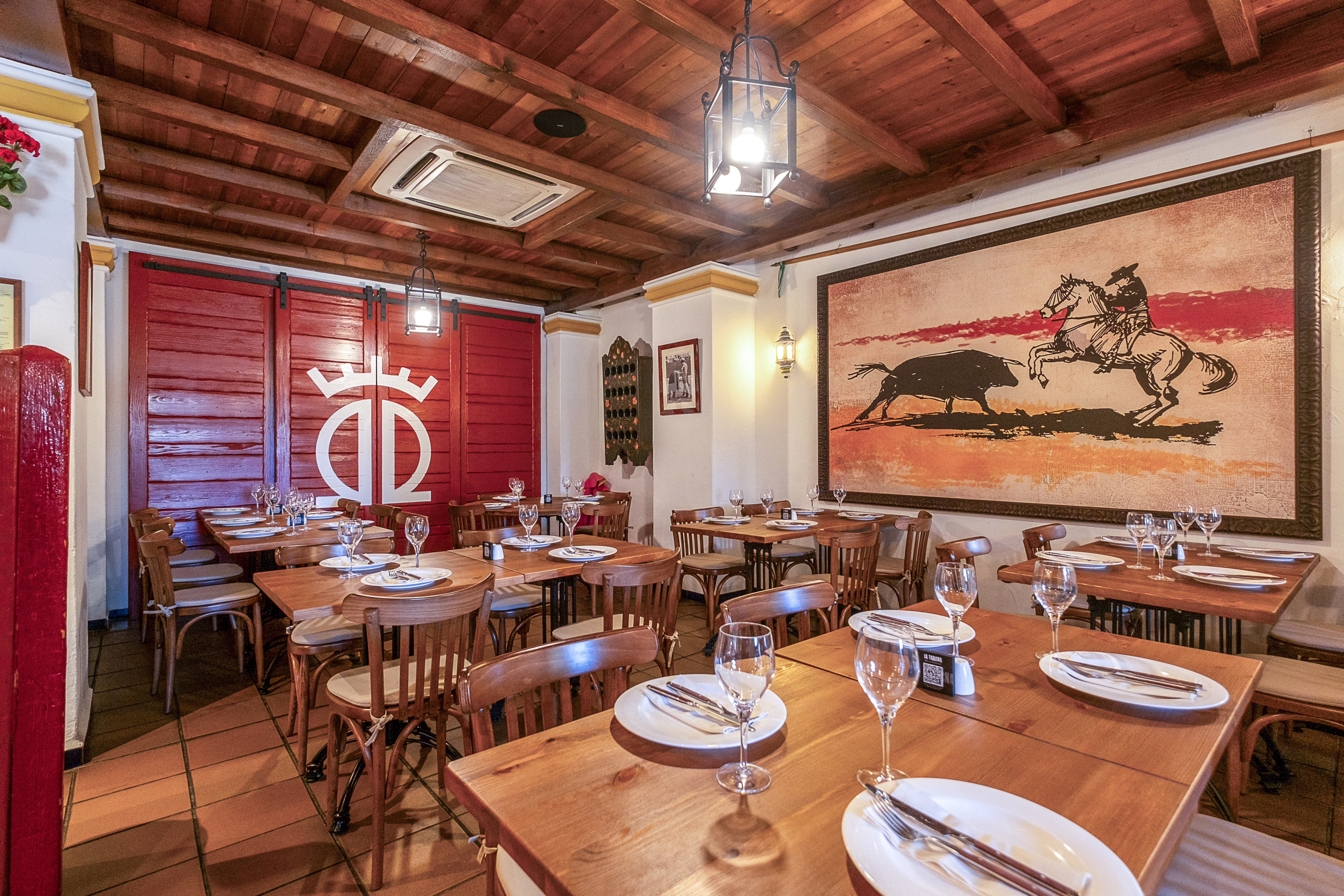 a room with tables and chairs