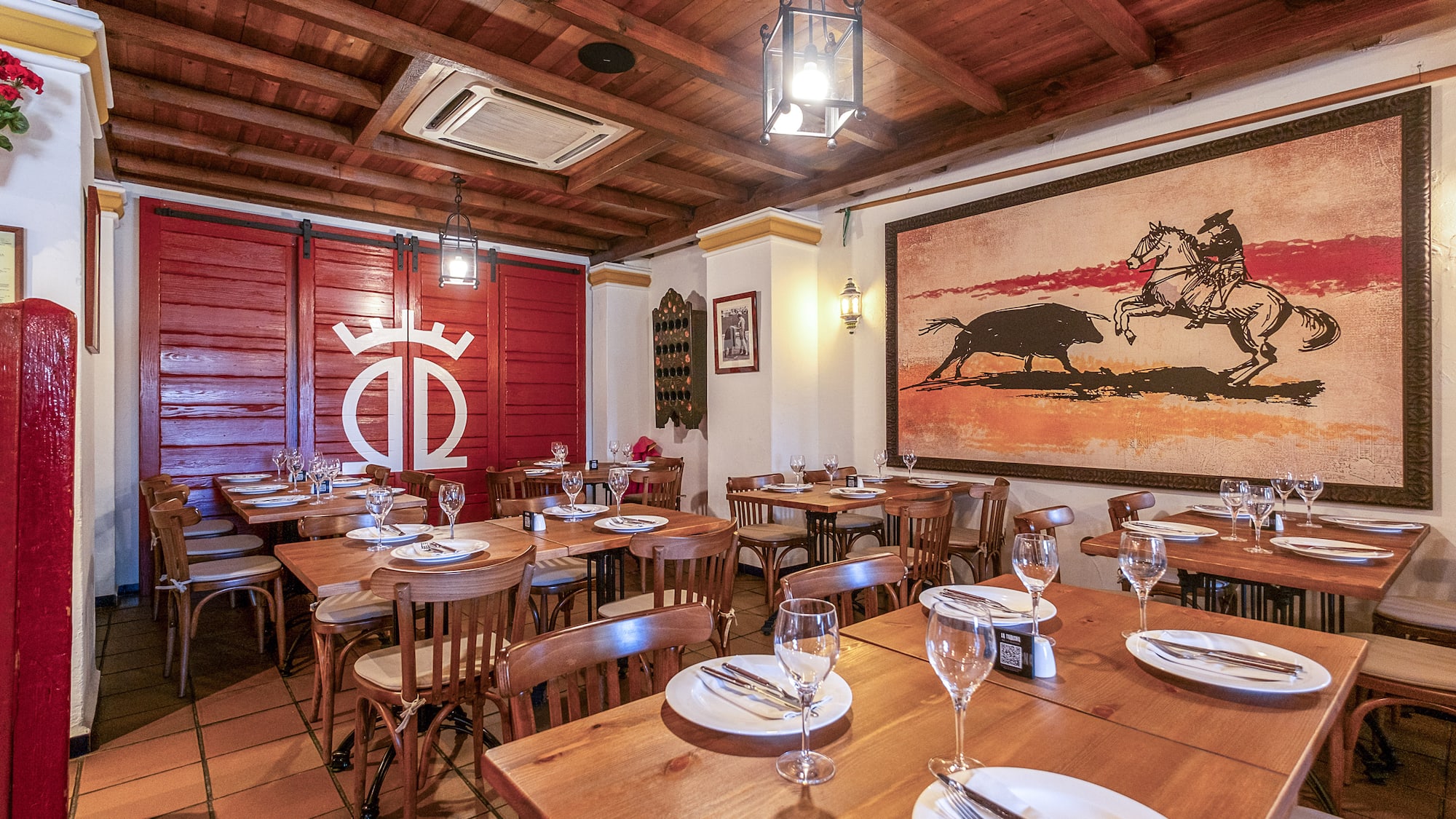 a room with tables and chairs