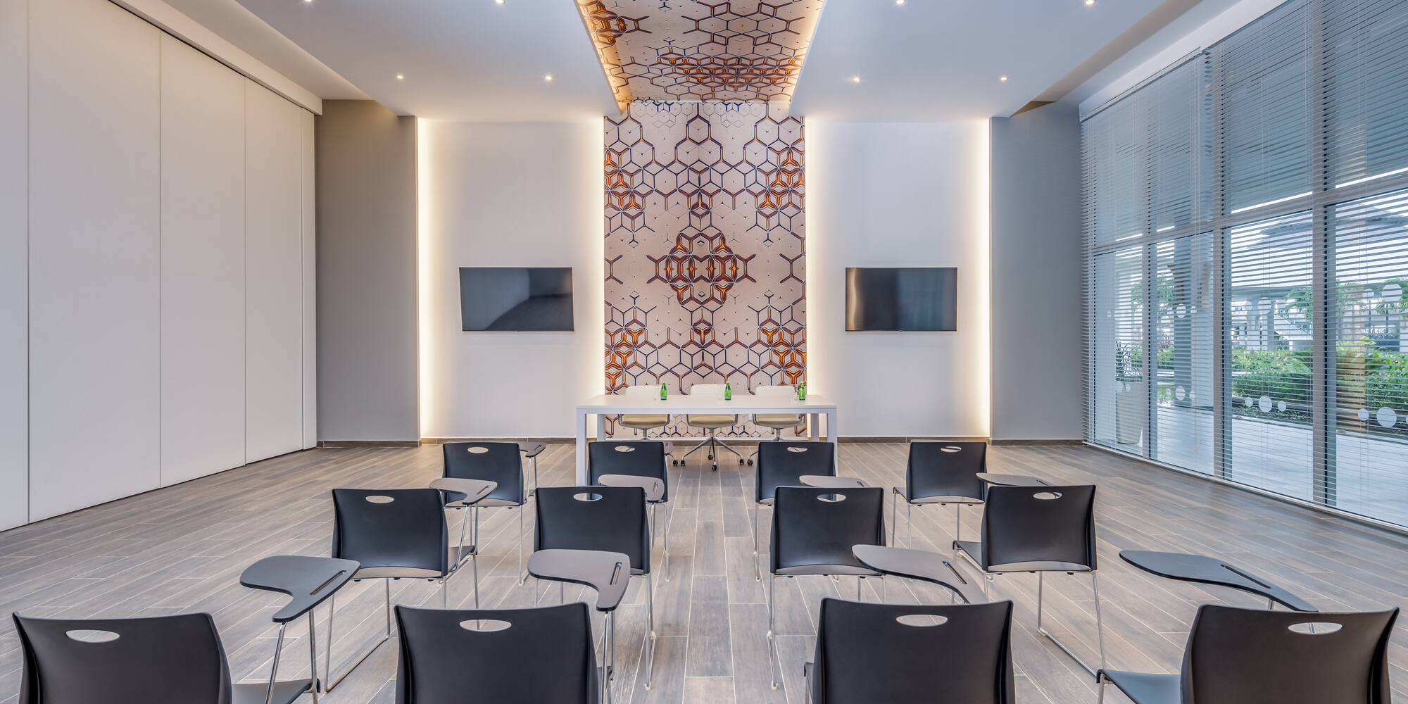 a room with chairs and a table