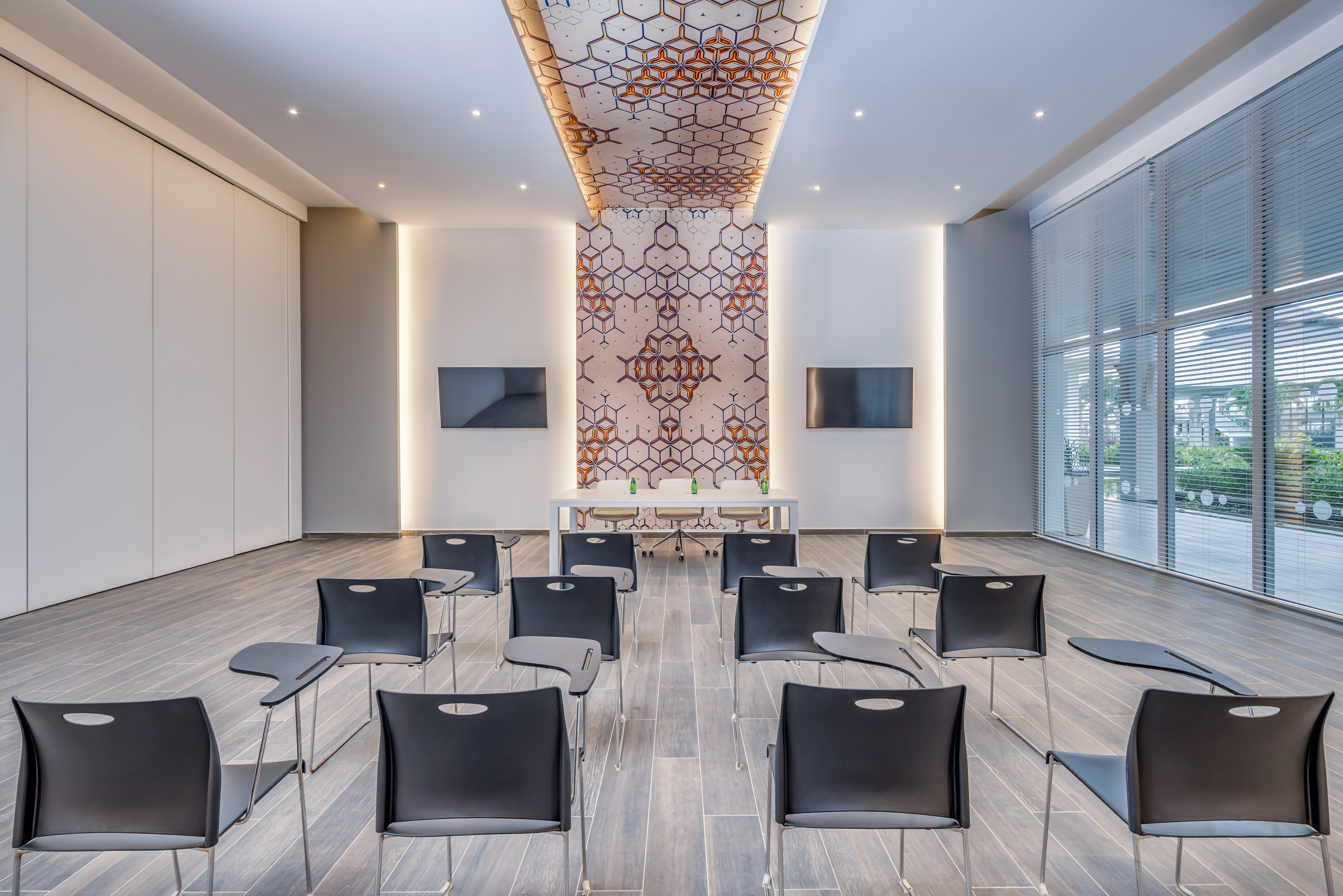 a room with chairs and a table