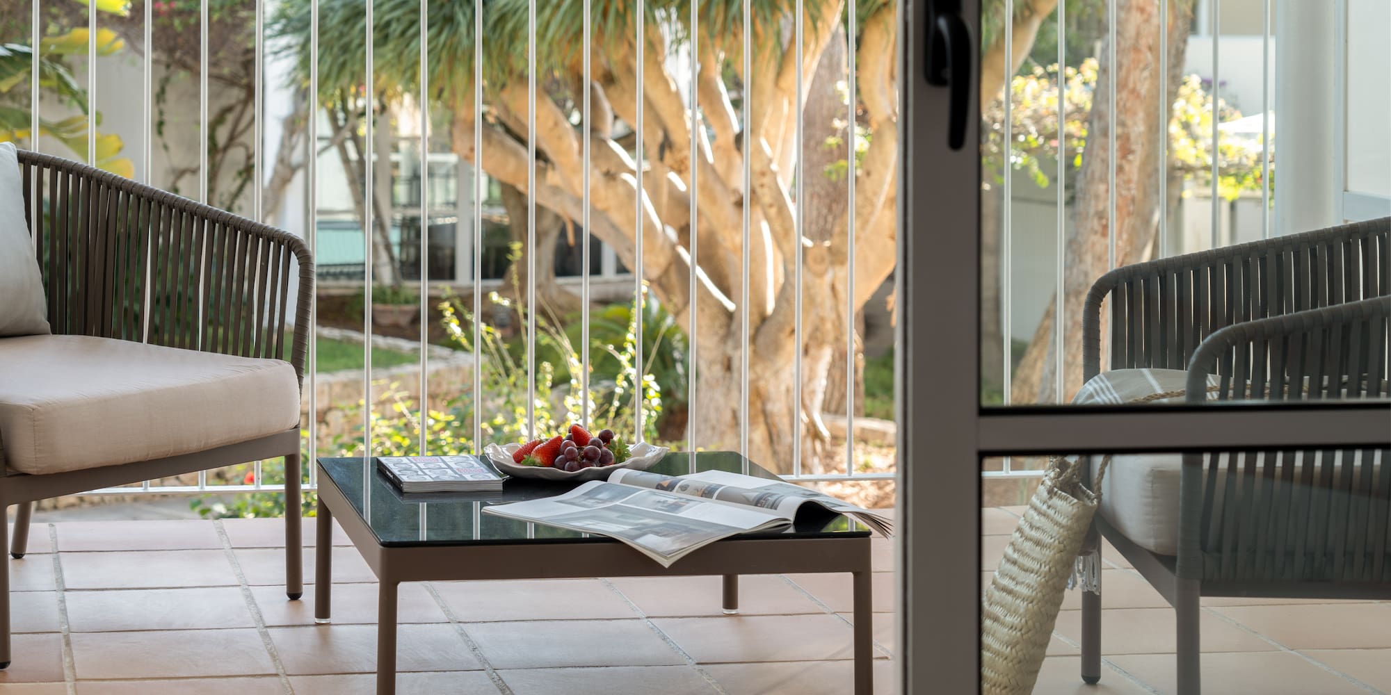 a table and chairs on a patio