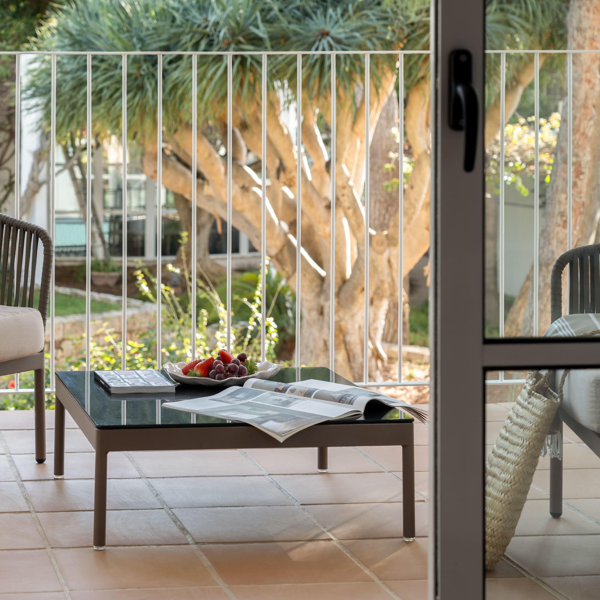 a table and chairs on a patio