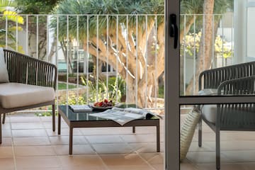 a table and chairs on a patio