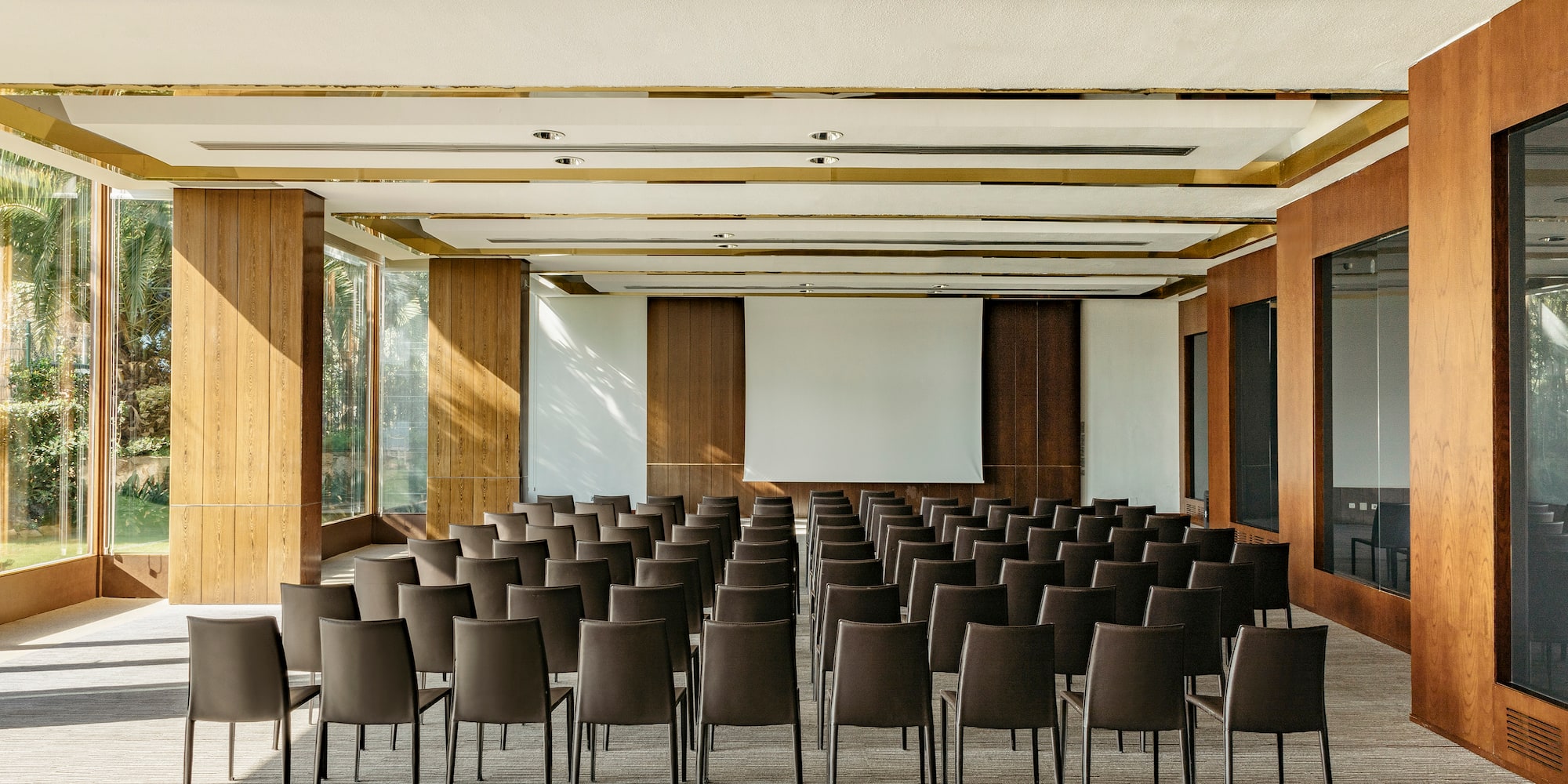 a room with rows of chairs