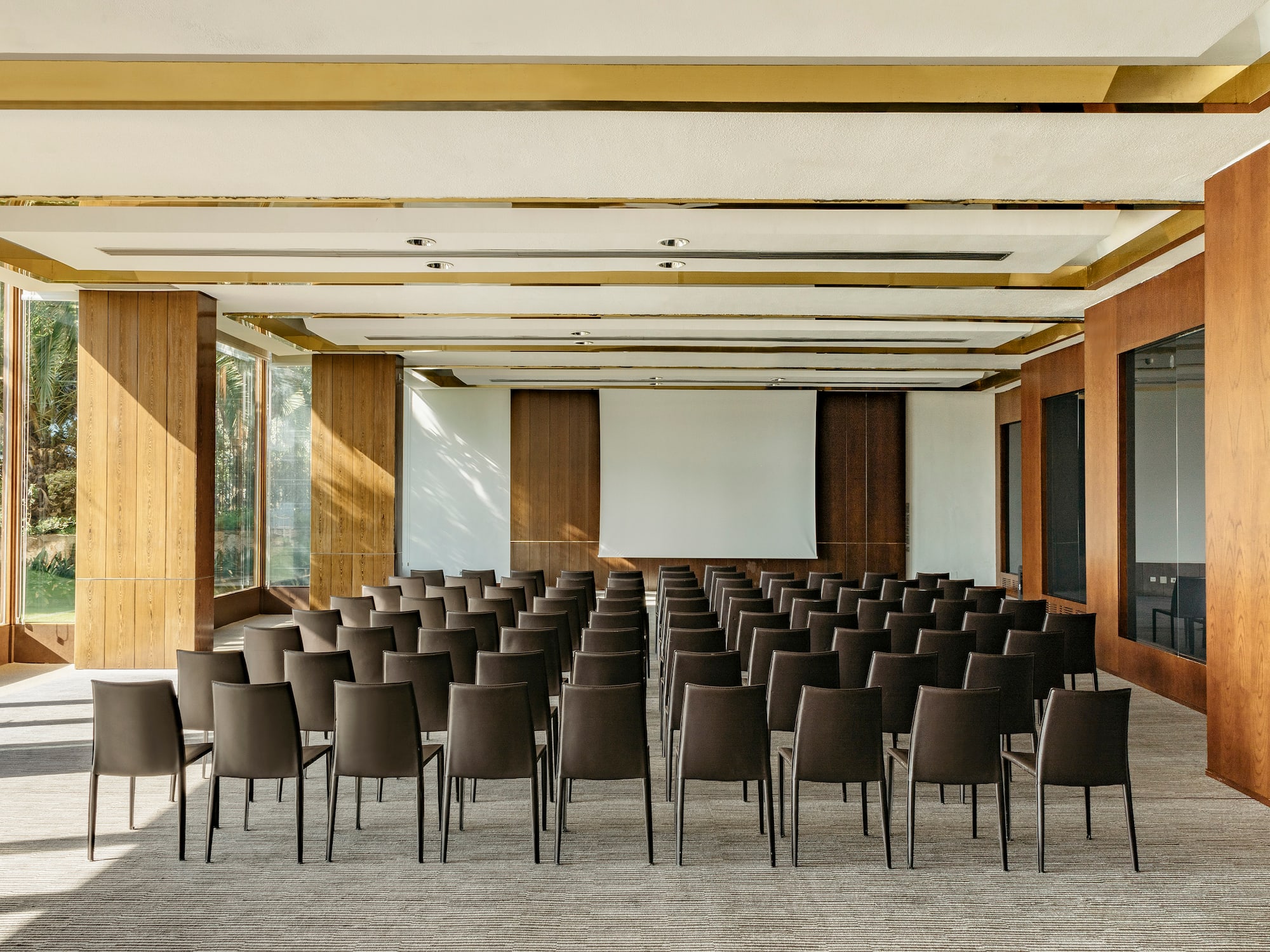 a room with rows of chairs