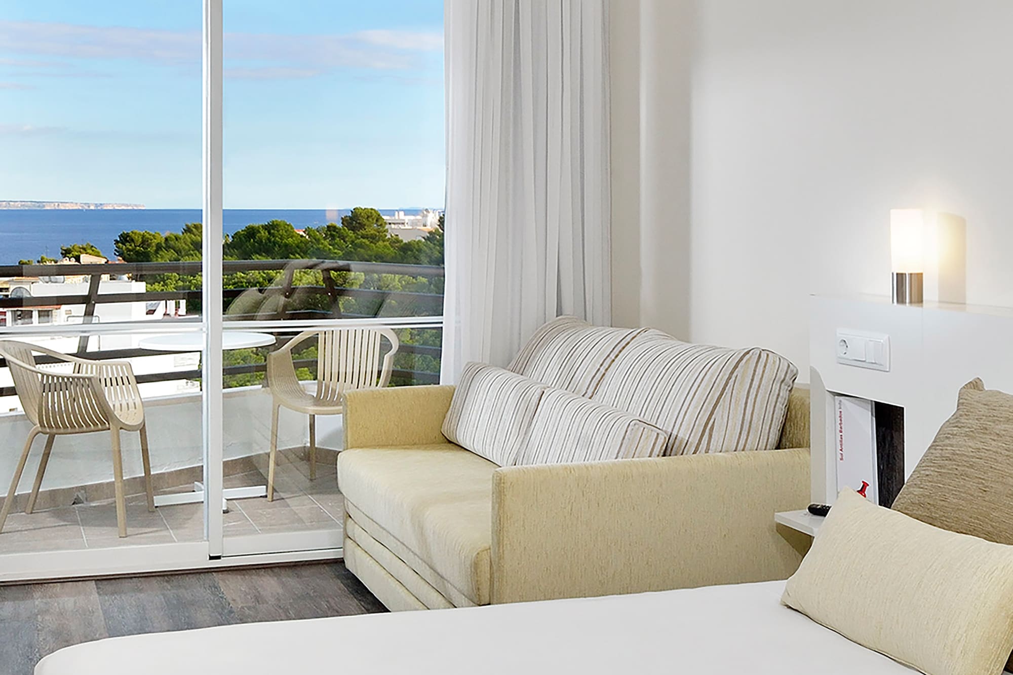 a room with a bed and a fireplace