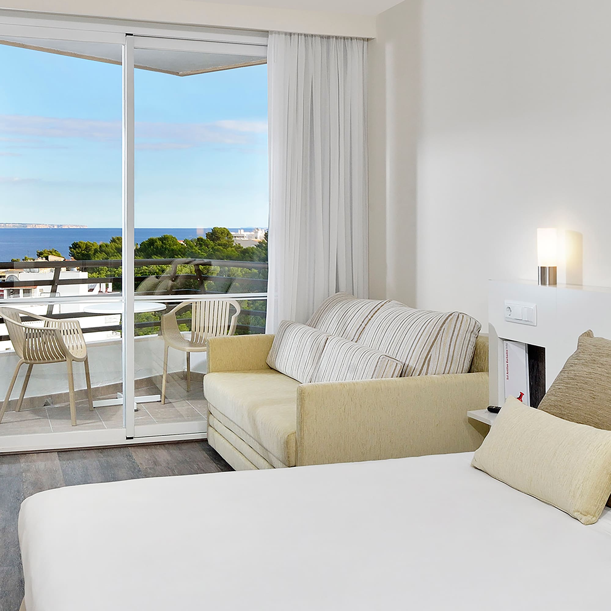 a room with a bed and a fireplace