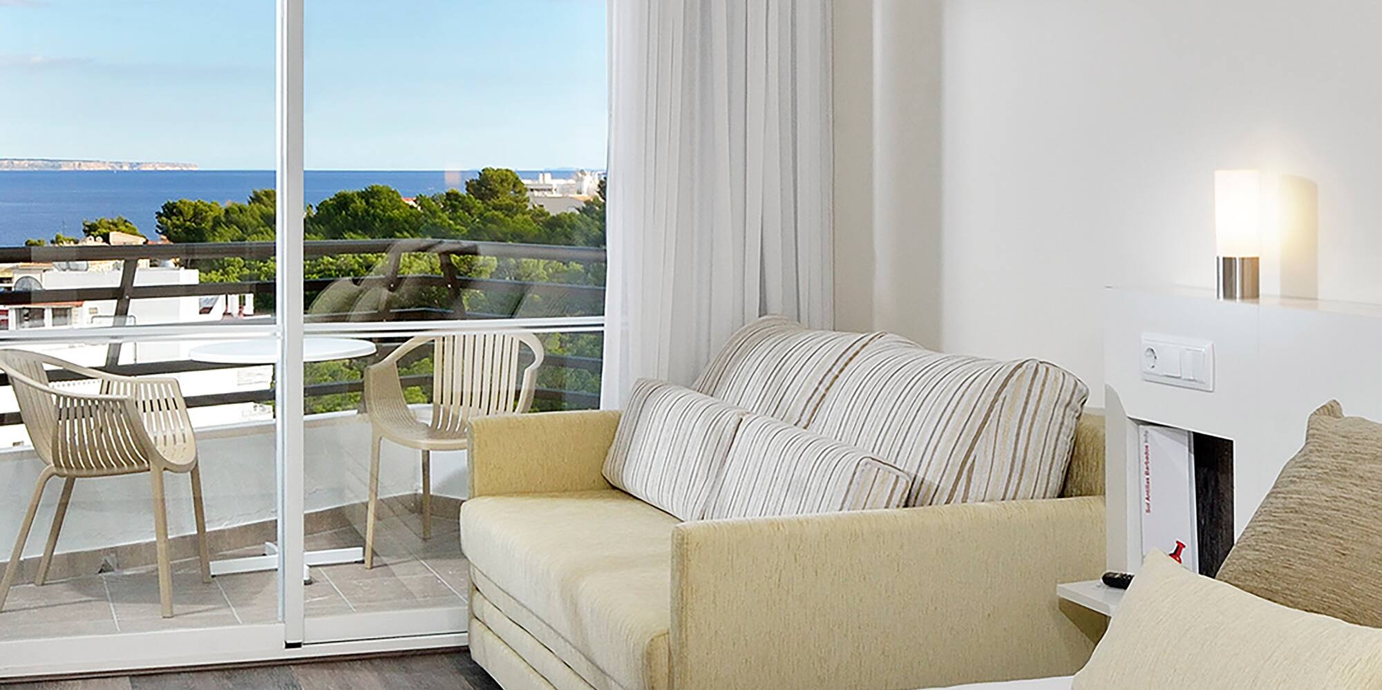 a room with a bed and a fireplace