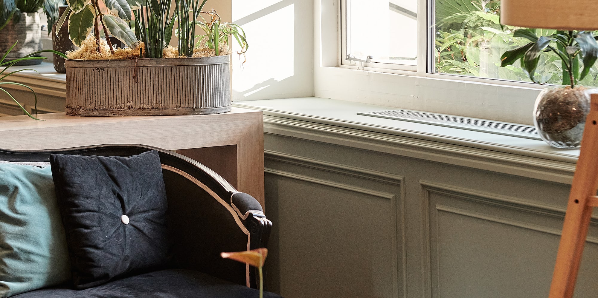 a room with a couch and a window