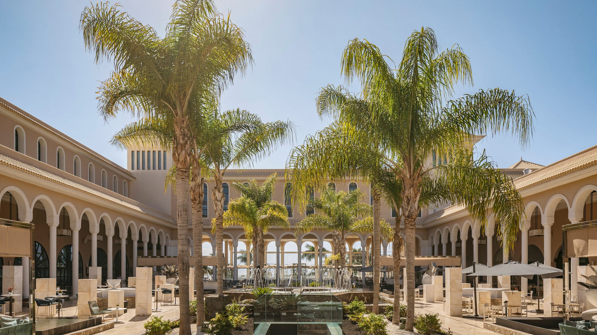a building with palm trees