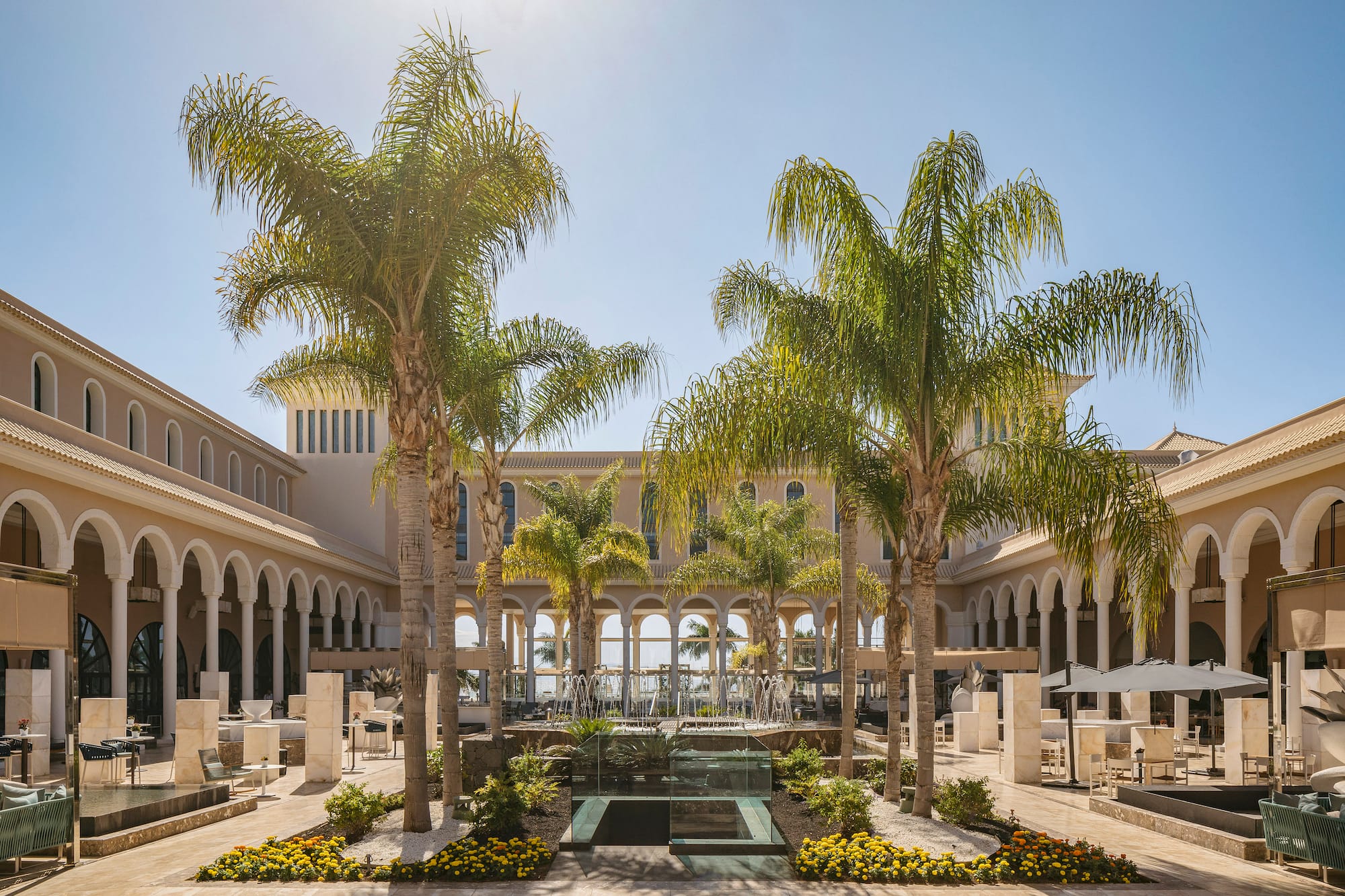 a building with palm trees