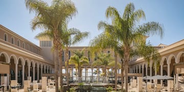 a building with palm trees