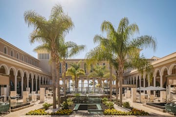 a building with palm trees