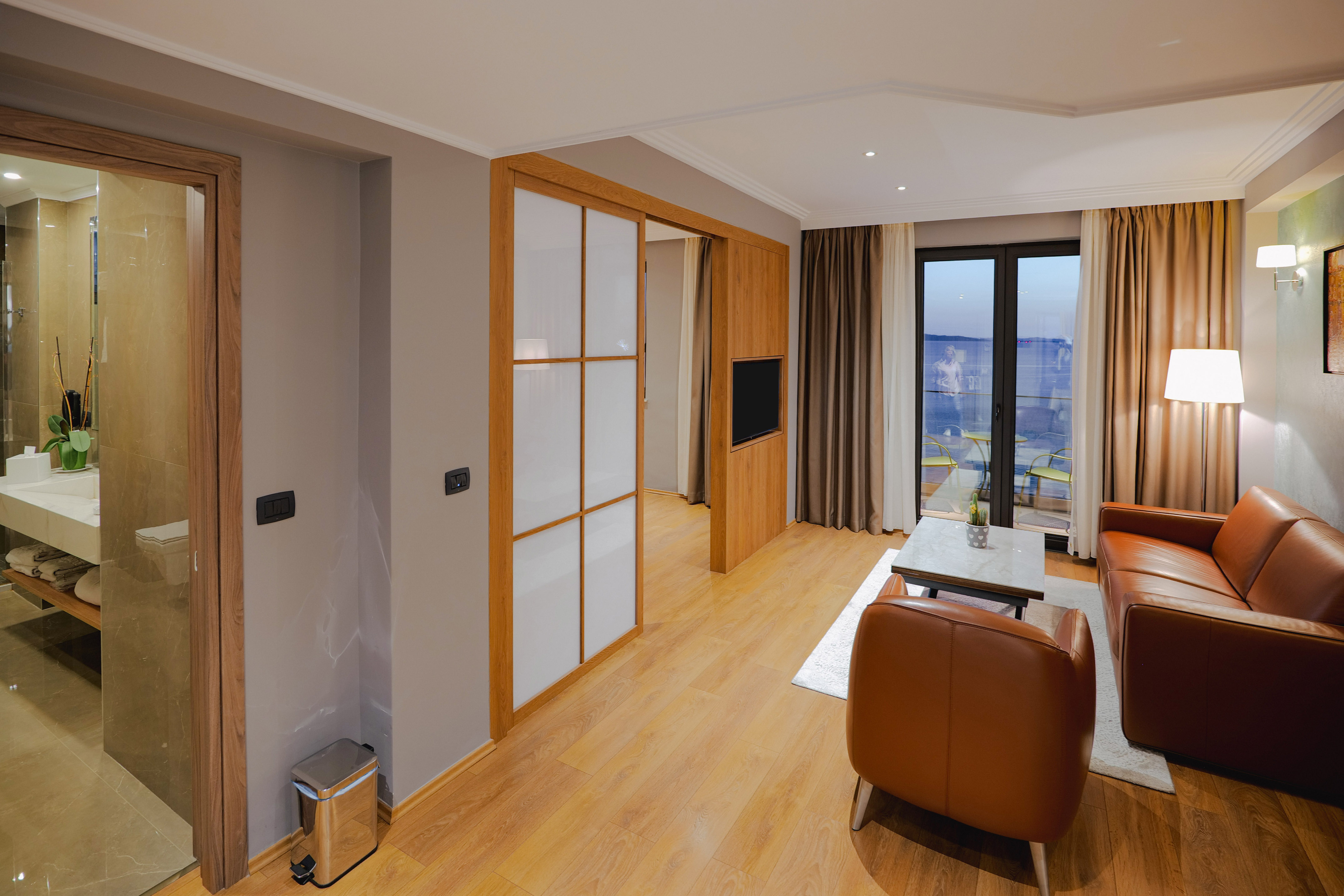 a room with a couch and a tv