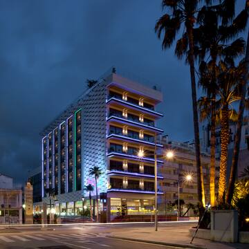 a building with lights on the side of it