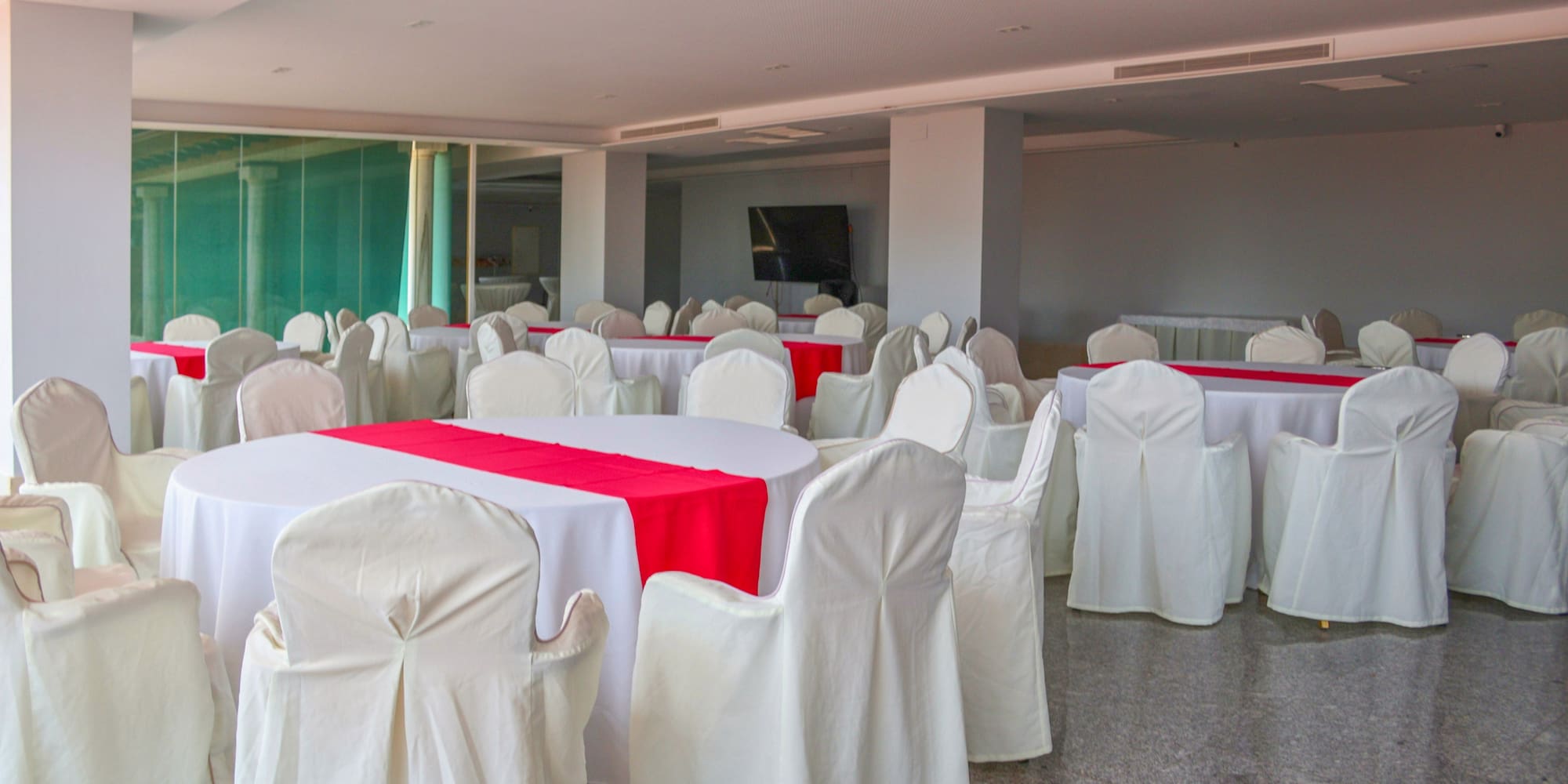 a room with tables and chairs