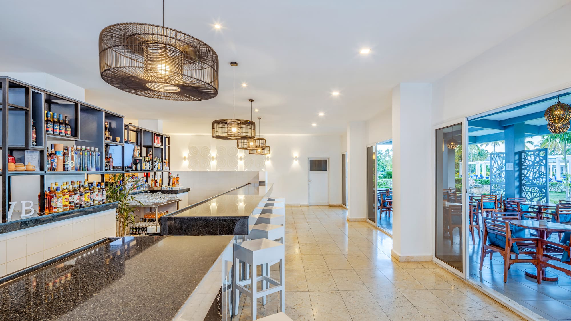 a bar with a counter and stools