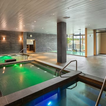 a indoor pool with green water