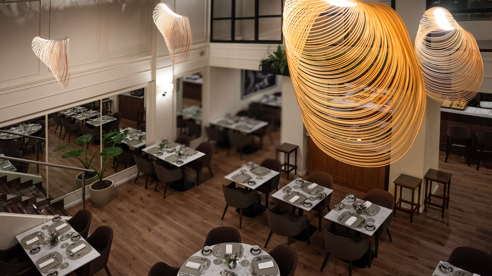 a room with tables and chairs