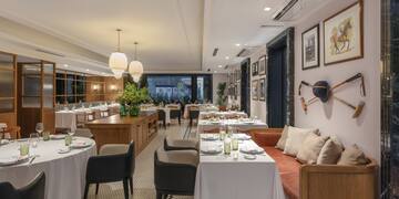 a room with tables and chairs