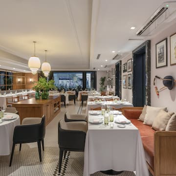 a room with tables and chairs