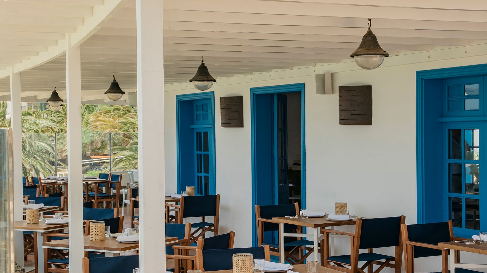 a restaurant with tables and chairs