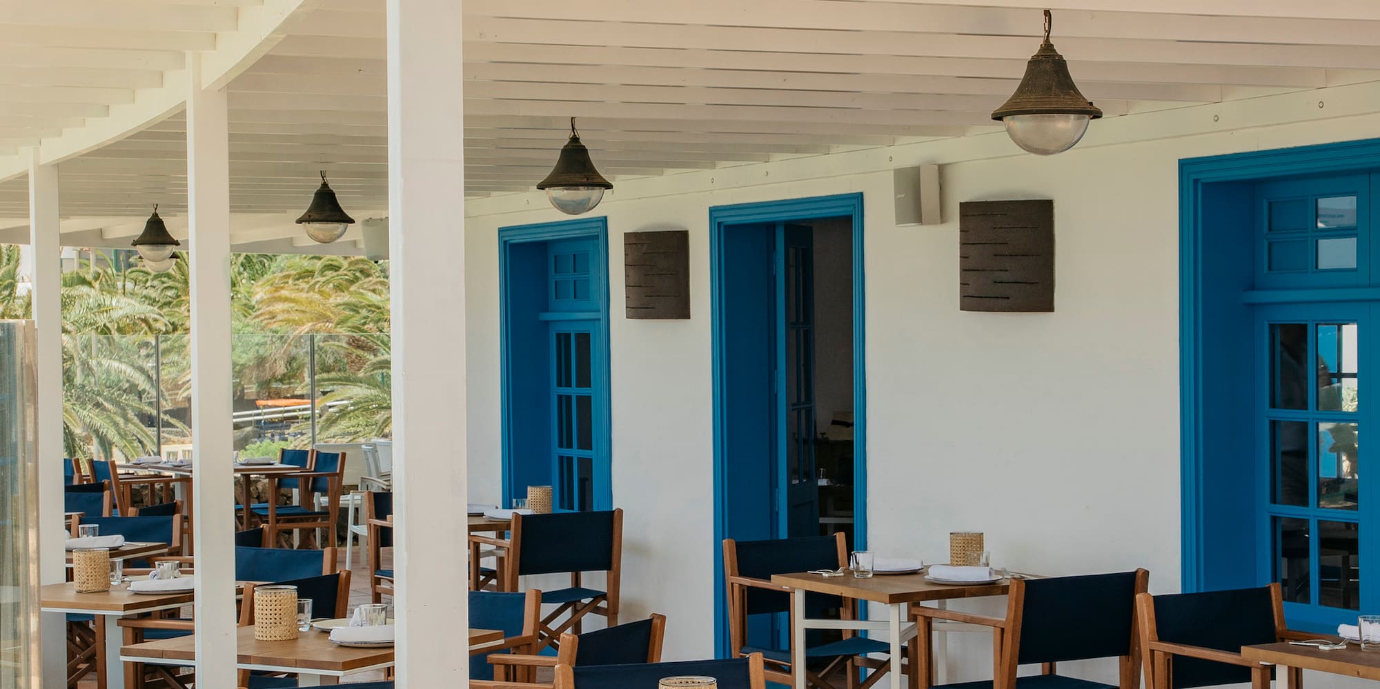 a restaurant with tables and chairs