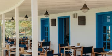 a restaurant with tables and chairs