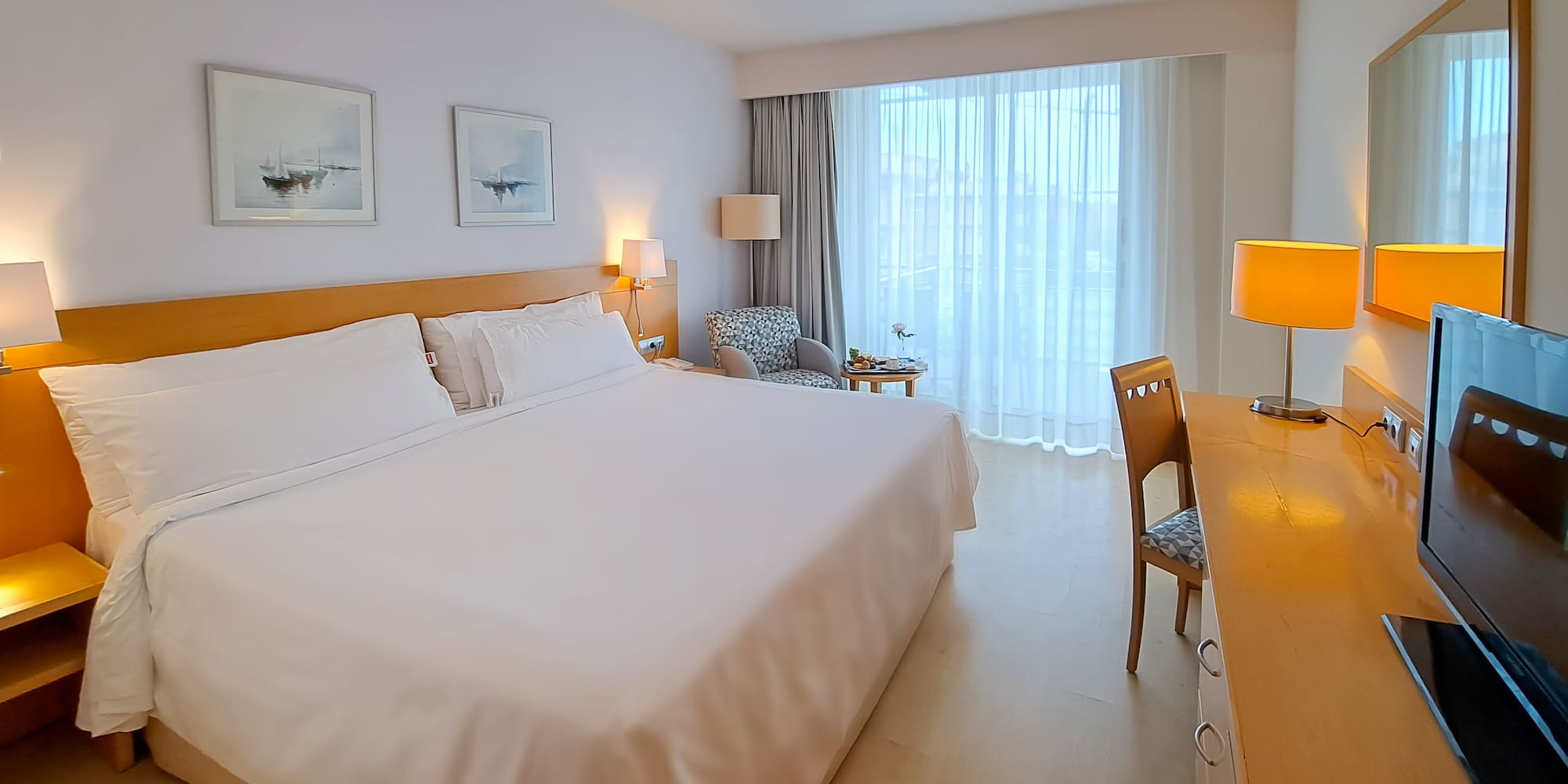 a room with a bed and a desk