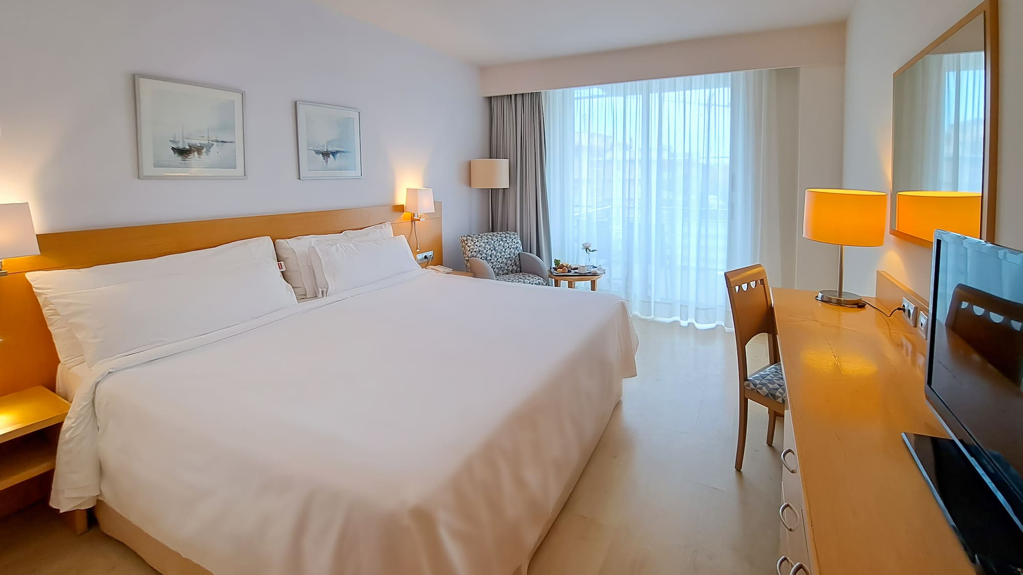 a room with a bed and a desk