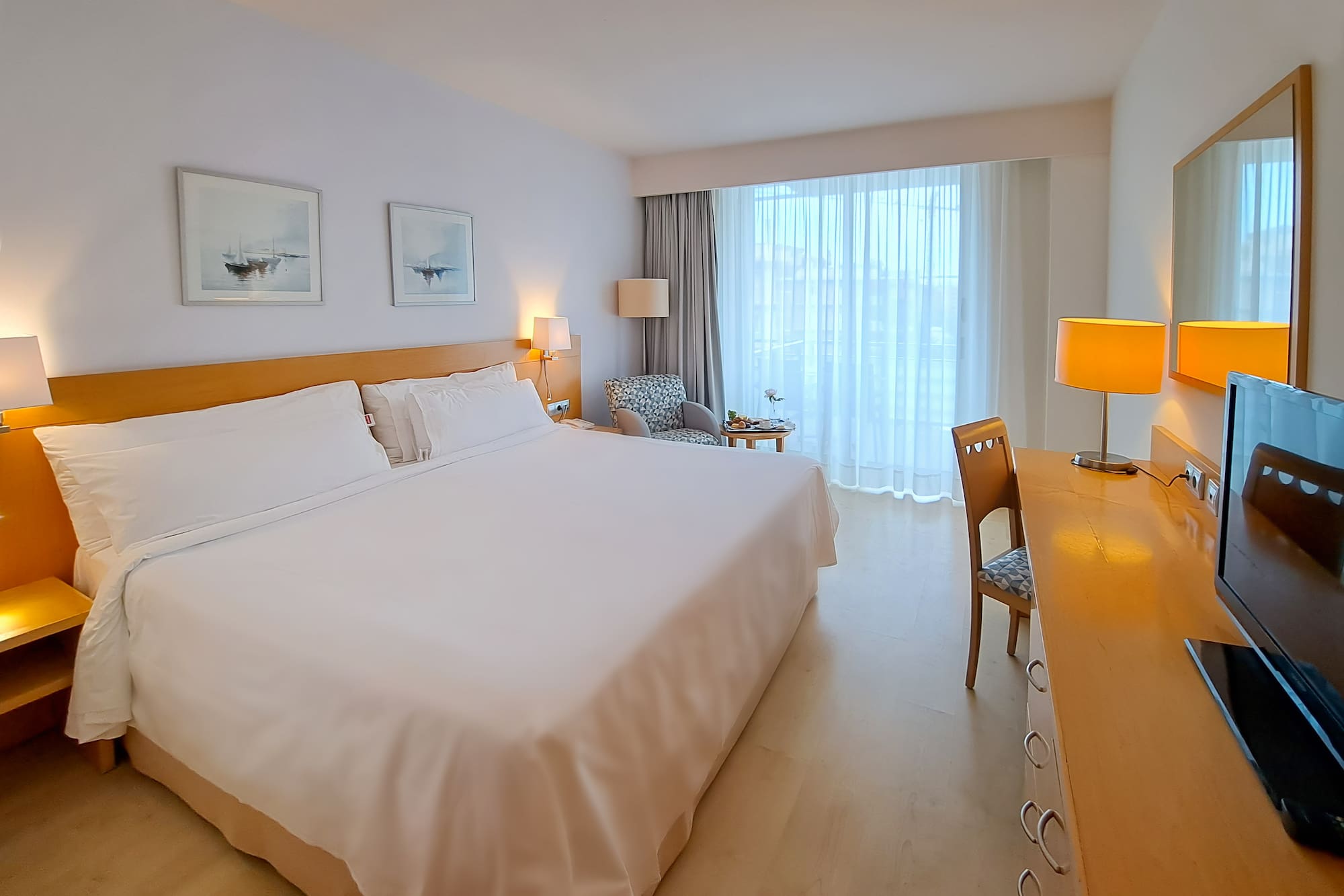 a room with a bed and a desk