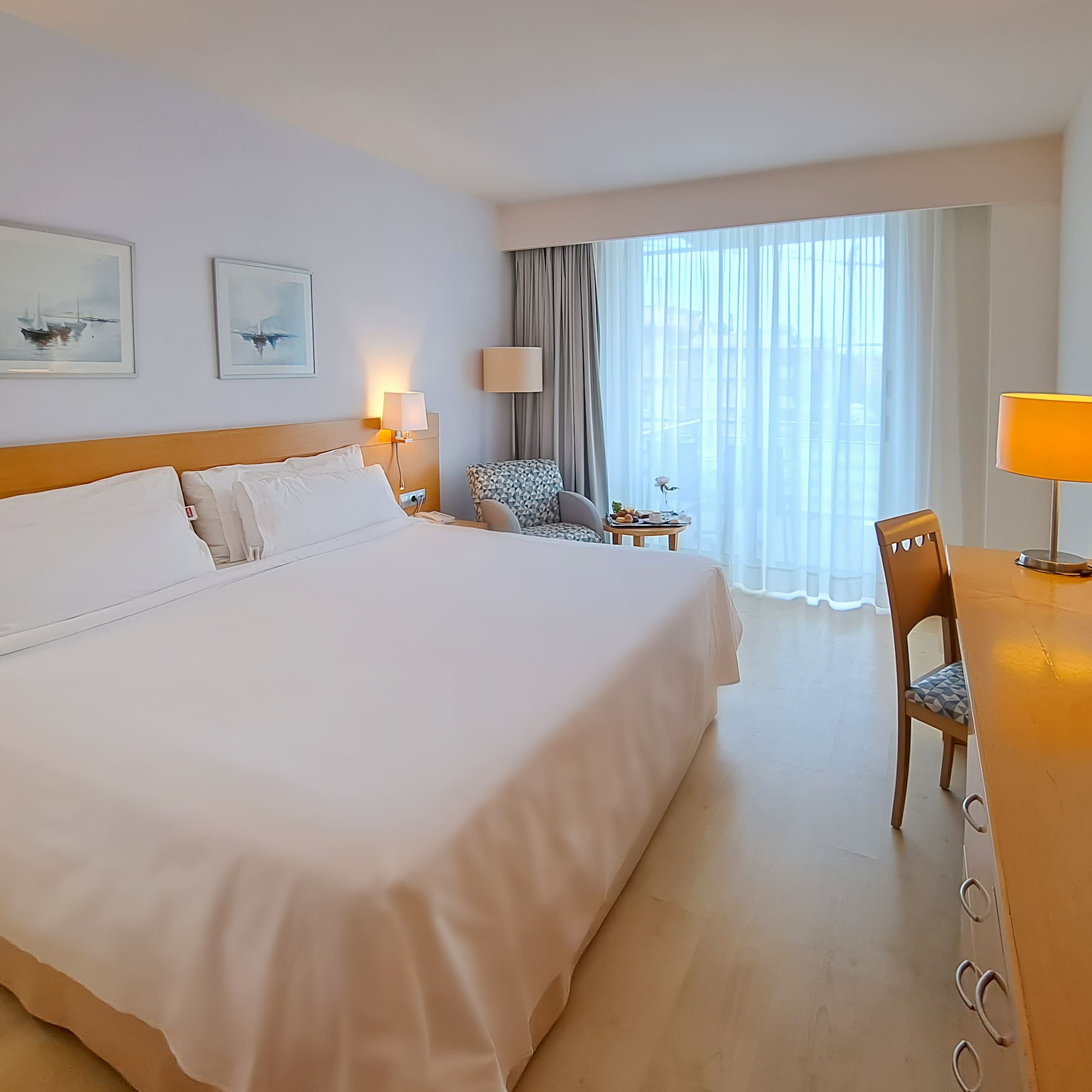 a room with a bed and a desk