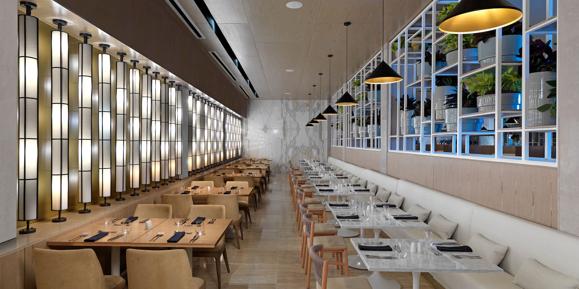 a restaurant with tables and chairs