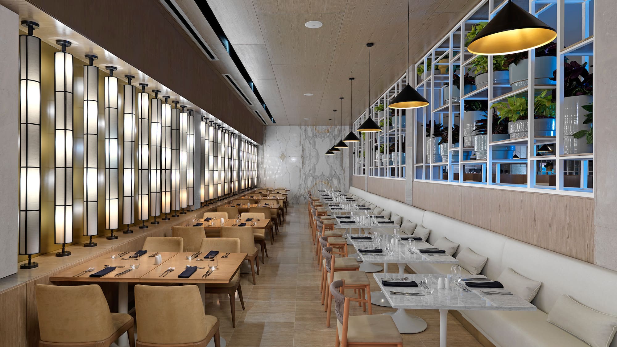 a restaurant with tables and chairs