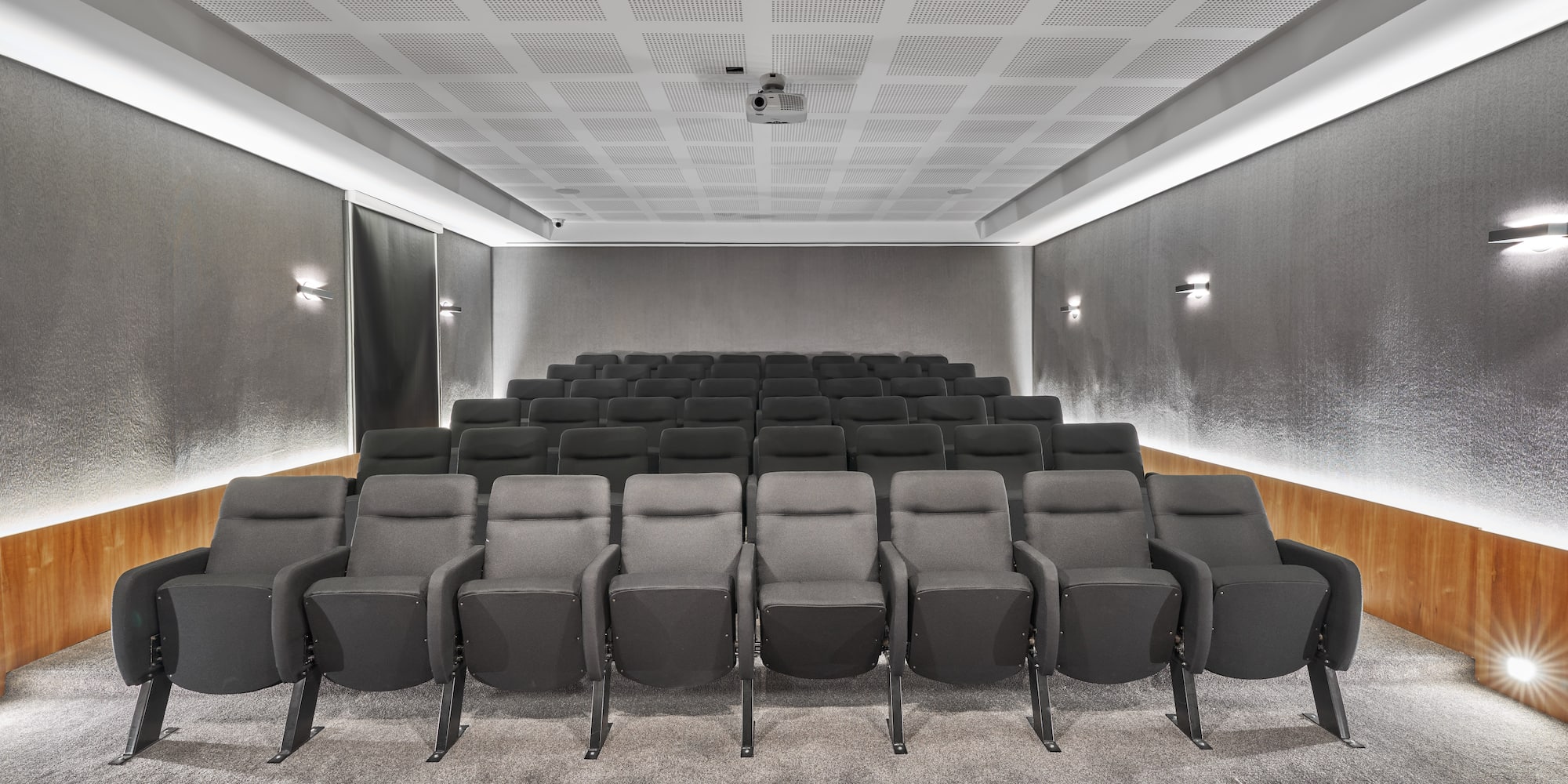 a room with rows of chairs
