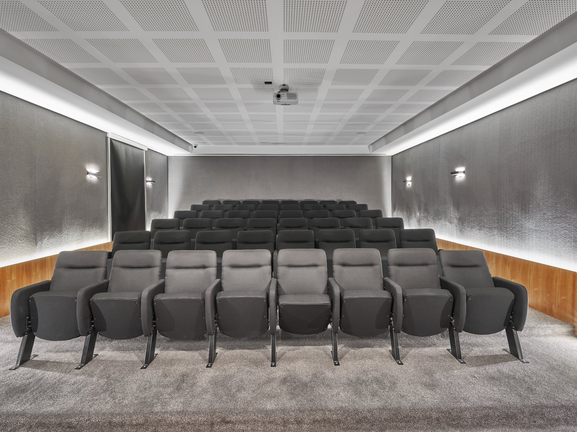 a room with rows of chairs