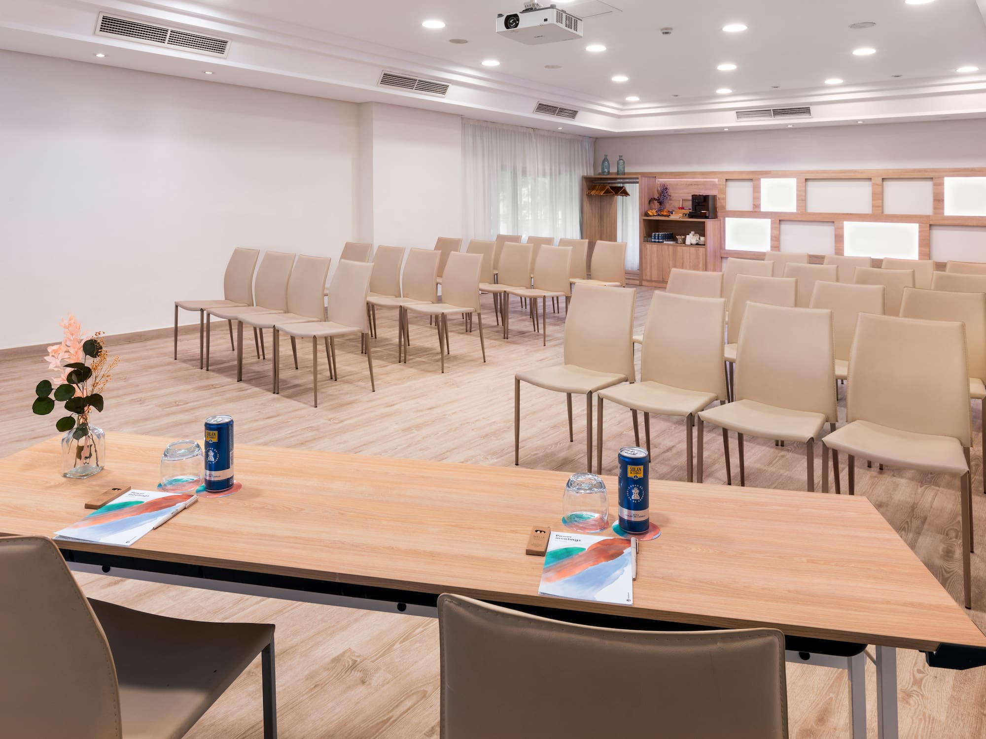 a room with tables and chairs