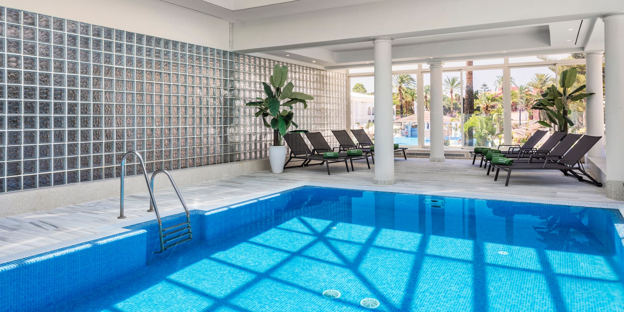 a swimming pool inside a room